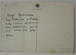 NOEL BABA VE ÖNÜNE YAZILMIŞ YENİ YIL KUTLAMA MESAJI KARTPOSTALI,ARKASINA YAZILMIŞ,RENKLİ, 12 X 17 CM EBADINDA