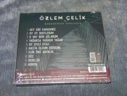 ÖZLEM ÇELİK - KARADENİZE YOLCULUK..DÖNEM BASKISI SIFIR AÇILMAMIŞ AMBALAJINDA MÜZİK CD SİDİR..