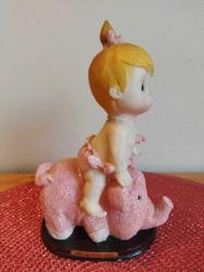 1980'LERDEN VİNTAGE POLİRESAN FANTASTİK BİBLO DOMUZUN ÜZERİNDE KIZ BEBEK 17 CM