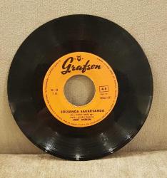 ZEKİ MÜREN / ŞARAP MAHZENDE YILLANIR, SOLSANDA SARARSANSA