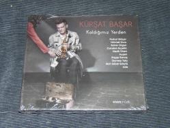KÜRŞAT BAŞAR - KALDIĞIMIZ YERDEN ..DÖNEM BASKISI SIFIR AÇILMAMIŞ AMBALAJINDA MÜZİK CD SİDİR..