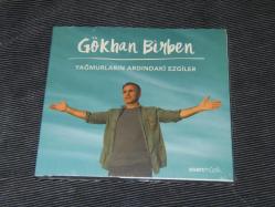 GÖKHAN BİRBEN - YAĞMURLARIN ARDINDAKİ EZGİLER ..DÖNEM BASKISI SIFIR AÇILMAMIŞ AMBALAJINDA MÜZİK CD SİDİR..