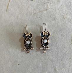 Eskitme, altın küpe görselinde küpe.