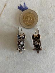 Eskitme, altın küpe görselinde küpe.