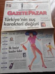 Milliyet Gazete Pazar - 12 Temmuz 1998 - Türkiye 1. Liginde Oynayan Yabancı Futbolcuların Fransa 98'deki Performansları - 12 Bin Yıldır Ekmek Yiyoruz - Sloganlar Politikacılar Ve İnternet - Duygu Asena - Gani Müjde Tartışılan Film Lolita Türkiye'de Gösterimde - Tecavüz Tartışması - Tarihin Tarzanları- İlk Faşist Kadın Lider Paula Hanson
