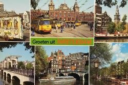 ŞEHİR KARTPOSTALI-HOLLANDA/AMSTERDAM KANAL YATLAR MİMARİ YAPILAR FERİBOT VE ŞEHRİN GÜNDÜZ GÖRÜNTÜSÜ,ARKASINA YAZILMAMIŞ,RENKLİ, 11 X 15 CM EBADINDA - 1950'LER, 1960'LAR, 1970'LER, 1980'LER