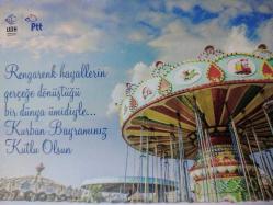 ÜSTÜNDE ''KURBAN BAYRAMINIZ KUTLU OLSUN'' YAZAN ATLI KARINCA KARTPOSTALI,ARKASINA YAZILMAMIŞ,RENKLİ, 11 X 15 CM EBADINDA