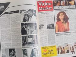 Film Market Aylık Filmcilik ve Sinemacılık Dergisi - Haziran 1983 - Yeşilçam'da Film Yapımcılar Birliği Oluşuyor - Andrzej Wajda - Aydın Gün - Basileus Dörtlüsü - Kadınlar Kenti Filmi - Orkestra Provası - Yusuf Şahin Toplu Gösterisi - Göl Filmi - Dolap Beygiri Filmi - Video Baskınları - Deborah Harry - Video Korsanının Kabusu - Video ve Teknik - Video Piyasası Renkleniyor - Hakan Sonok - Hayrettin Kara - Kentlerde Son Durum - Hüseyin Kuzu - Bandırma'da Video Etkinlikleri - Video Olayının Hukuksal Yönleri - Abdullah Şanran - Hüseyin Kuzu - Stüdyolar - Nejat Ulusay - Dünyadan - Cannes Sonuçları - Box Office fotoğraf ve haberi - Tam Takım Dergi