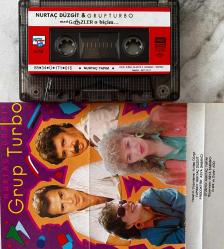 NURTAÇ DÜZGİT GRUP TURBO- MAVİ GÖZLER O BİÇİM KASET