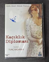 KAÇIKLIK DİPLOMASI * TANER BARLAS * MERİÇ BAŞARAN * BİR TUNÇ BAŞARAN FİLMİ *  DVD AMBALAJINDA