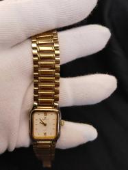 SAAT KOL SAATİ MOMENTUS UNİSEX KOL SAATİ.22 AYAR ALTIN KAPLAMA.POLİSAJA İHTİYACI VAR.ÇALIŞIYOR 175