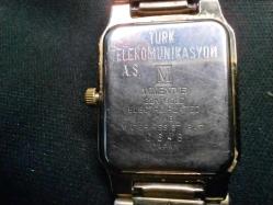 SAAT KOL SAATİ MOMENTUS UNİSEX KOL SAATİ.22 AYAR ALTIN KAPLAMA.POLİSAJA İHTİYACI VAR.ÇALIŞIYOR 175