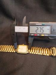 SAAT KOL SAATİ MOMENTUS UNİSEX KOL SAATİ.22 AYAR ALTIN KAPLAMA.POLİSAJA İHTİYACI VAR.ÇALIŞIYOR 175