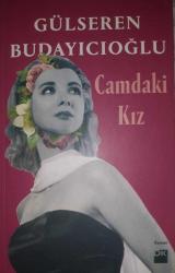 CAMDAKİ KIZ