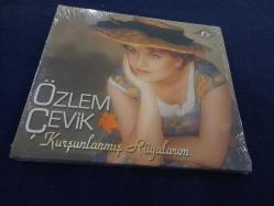 ÖZLEM ÇEVİK KURŞUNLANMIŞ RÜYALARIM MÜZİK CD   ( SIFIR )