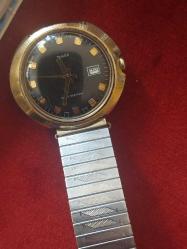 Timex Erkek Kol  Saati,  Altın ve Paslanmaz Çeliğin Muhteşem Uyumu. Çalışır vaziyette Kurmalı, Su Geçirmez. . 1950 lerden..