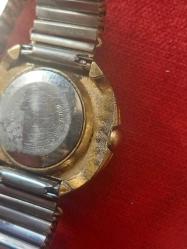 Timex Erkek Kol  Saati,  Altın ve Paslanmaz Çeliğin Muhteşem Uyumu. Çalışır vaziyette Kurmalı, Su Geçirmez. . 1950 lerden..