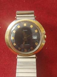 Timex Erkek Kol  Saati,  Altın ve Paslanmaz Çeliğin Muhteşem Uyumu. Çalışır vaziyette Kurmalı, Su Geçirmez. . 1950 lerden..