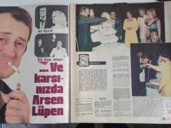 TV'de 7 Gün Haftalık Aktüalite Sinema Tiyatro Müzik ve Magazin Dergisi - 16 Haziran 1975 - Sayı:19 - Şenay'la Altın Orfe'de bir hafta - Ayla Algan ile Halit Kıvanç Anlatıyor: ve karşınızda Arsen Lüpen - Mazi Kalbimde Yaradır - Hikmet Feridun Es - İlhan İrem Yoksa Aşık Mı? - Türkan Şoray - Rüçhan Adlı - Ali Rıza Binboğa - Semiha Yankı - Muazzez Abacı - Hadiye Nugay'ın evliliği dört ay sürdü - Gülgün Ural - Hasan Eğitim - Zafer Cilasun - Muhsin Çelebi - Kevser Tanrıkut - Patricia Carli - Altın Orfe'de Şenay'la bir hafta - Fatma Girik - Tugay Toksöz - Hakan Balamir - Tahsin Öztin - Nilüfer Alman TV'sinde gönülleri fethetti - Almanya'daki Mutlu Günler - Tülay - Alpay - Bu da yapılmayan marmaris festivalinin hikayesi - Sezai Solelli - Radyo ve televizyon - İşte Mine Özdöl'ün iki dünyası - Mikrofonda 9 yıl - Avni Anıl'da TV'den Ayrıldı fotoğraf ve haberi - Posterli Tam Takım Dergi
