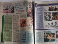 TV'de 7 Gün Haftalık Aktüalite Sinema Tiyatro Müzik ve Magazin Dergisi - 14 Temmuz 1975 - Sayı:23 - Füsun Önal kalbini kaybetti - Atilla Özdemiroğlu - İlhsan Şentürk - Halit Kıvanç - 4 Yeni Yuva Kuruldu - Tanju Okan'ın nikahını kadınlar kıydı - Zeliha evlendi ve sahneyi bırakıt - Ayşecik erdi muradına, biz çıkalım kerevetine - Hikmet Feridun Es - Uğur Dündar - Samim Var - Cenk Koray - Cem KAraca - Semiha Yankı - Nida Tüfekçi - Sevim Deran - Erol Deran - Uğurlugiller'in Dönüşü - Almanlar neler seyrediyor? - Tahsin Öztin - Nurhan Damcıoğlu Posteri - Cüneyt Arkın - Selda Alkor - Mine Yalçın - Betty Grable Sarışın Bomba - Nurhan Nur - Buster Keaton - Timur Hakmen'e olanlar oldu! - Cahit Oben - Arçelik Buzdolabı Reklamı - Kış Uykusuna Yatan Televizyon - Cüneyt Arkın da TV'ye ateş püskürüyor Ömer Tüzündür - Sema Tüzün - Yılmaz Dağdeviren fotoğraf ve haberi - Posterli Tam Takım Dergi