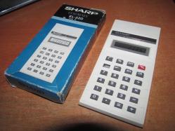 SHARP ELSİMATE EL-220  HESAP MAKİNASI KUTUSUNDA MADE İN JAPAN