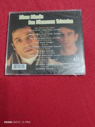 HALUK TOLGA İLHAN VE CEM BERAN SERTKAYA DÖNEN DÖNSÜN BEN DÖNMEZEM YOLUMDAN CD AMBALAJINDA
