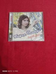 Efemera - TUĞÇE ÖZCAN SEVDİĞİM CD AMBALAJINDA - kitantik - kitaLog