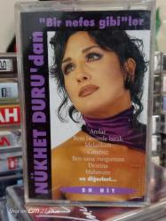 NÜKHET DURU BİR NEFES GİBİLER