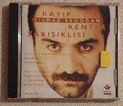 YILMAZ ERDOĞAN ***KAYIP KENTİN YAKIŞIKLISI(SARI BANDROL DÖNEM BASKI)