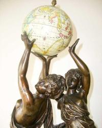 Le Globe Fransız sanatçı  Petit imzalı tutya heykel, mitolojik kadın figürlü. İmzalı. Y:62 cm.
