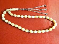 Gümüş püsküllü 33'lük sedef taşlı tesbih. Püskül dahil 30cm.