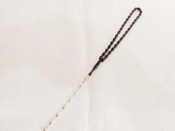 Ateş kehribar, altın rengi kamçılı,  usta işi,  arpa kesim 33'lük tesbih. İmame dahil boy:22 cm.
