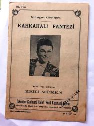 Zeki Müren'in Kahkahalı Fantezi Şarkısının Notaları - Muhayyer Kürdi Şarkı - İskender Kudmani Halefi Ferit Kudmani Yayımı (1469 No - 100 Kuruş) - 20,5 x 14 cm Ebadında - 4 Sayfa - Orijinal, Dönemine Ait
