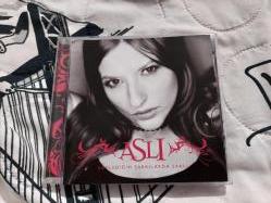 ASLI SÖYLEDİĞİM ŞARKILARDA SAKLI CD