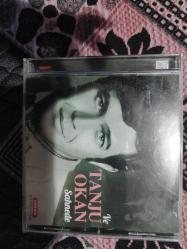 Ve Tanju Okan sahnede CD