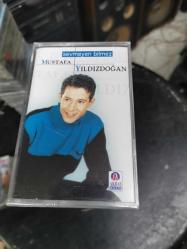 MUSTAFA YILDIZDOĞAN SEVMEYEN BİLMEZ KASET SIFIR AMBALAJINDA
