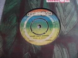 11 - YÜKSEL ÖZKASAP - Seher vakti evinizden - Beyaz atlı