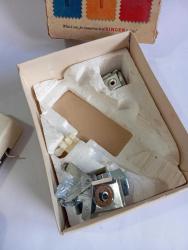 Singer dikiş makinesi parçası kutusunda