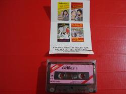 ZEKİ ALASYA METİN AKPINAR DELİLER 2 KAĞIT DÖNEM BASKI KASET