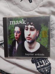 MASK KAPILAR ARDINDA CD
