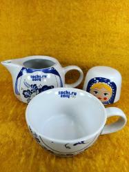 RUSYA SOCHI.RU 2014 OLİMPİYAT OYUNLARI HATIRASI MATRUŞKA BEBEK RESİMLİ PORSELEN DEMLİK VE FİNCAN