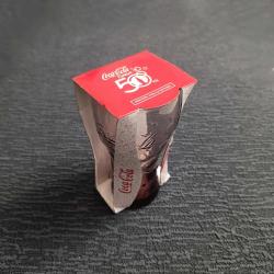 Kutusunda Coca Cola 50. Yıl Bardağı.