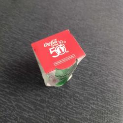 Kutusunda Coca Cola 50. Yıl Bardağı.