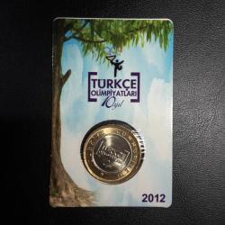 TÜRKÇE OLİMPİYATLARI 10. YILI HATIRA PARASI 1 TÜRK LİRASI  ÇİL ÖZEL KİTİNDE TCM 2414