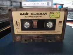 ARİF SUSAM - KARARSIZ GÖNLÜM - KASET [1987 Özer Plak - kağıt baskı - sarı bandrol - etiketin bir yüzünde yazı var]