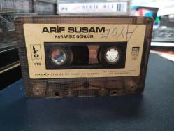 ARİF SUSAM - KARARSIZ GÖNLÜM - KASET [1987 Özer Plak - kağıt baskı - sarı bandrol - etiketin bir yüzünde yazı var]