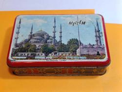 ÇY10---MELTEM CİKLET SULTANAHMET CAMİ KAPAKLI ESKİ TENEKE KUTU