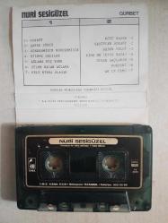 NURİ SESİGÜZEL GURBET KAĞIT BASKI