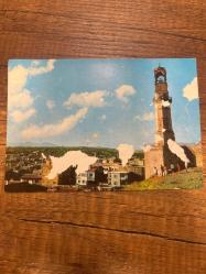 Niğde umumi görünüş ve saat kulesi  keskin color   kartpostalı 15x10.5 ebatında