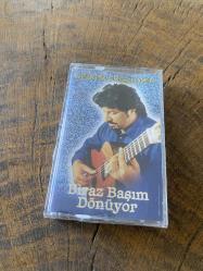 CENGİZ COŞKUNER - BİRAZ BAŞIM DÖNÜYOR - KASET (JELATİNİNDE)
